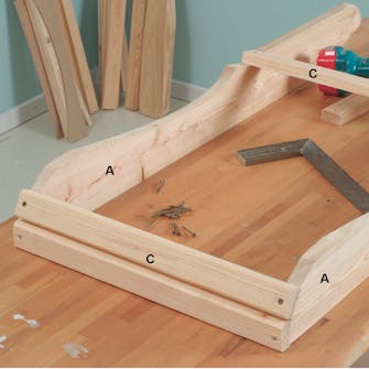 Fest et par setelister på Adirondack-stolen Fest et par setelister på Adirondack-stolen